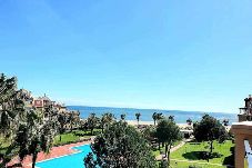 Apartamento en Isla Canela - Alcaudón - Ático de 3 dormitorios con terraza grande y piscina 